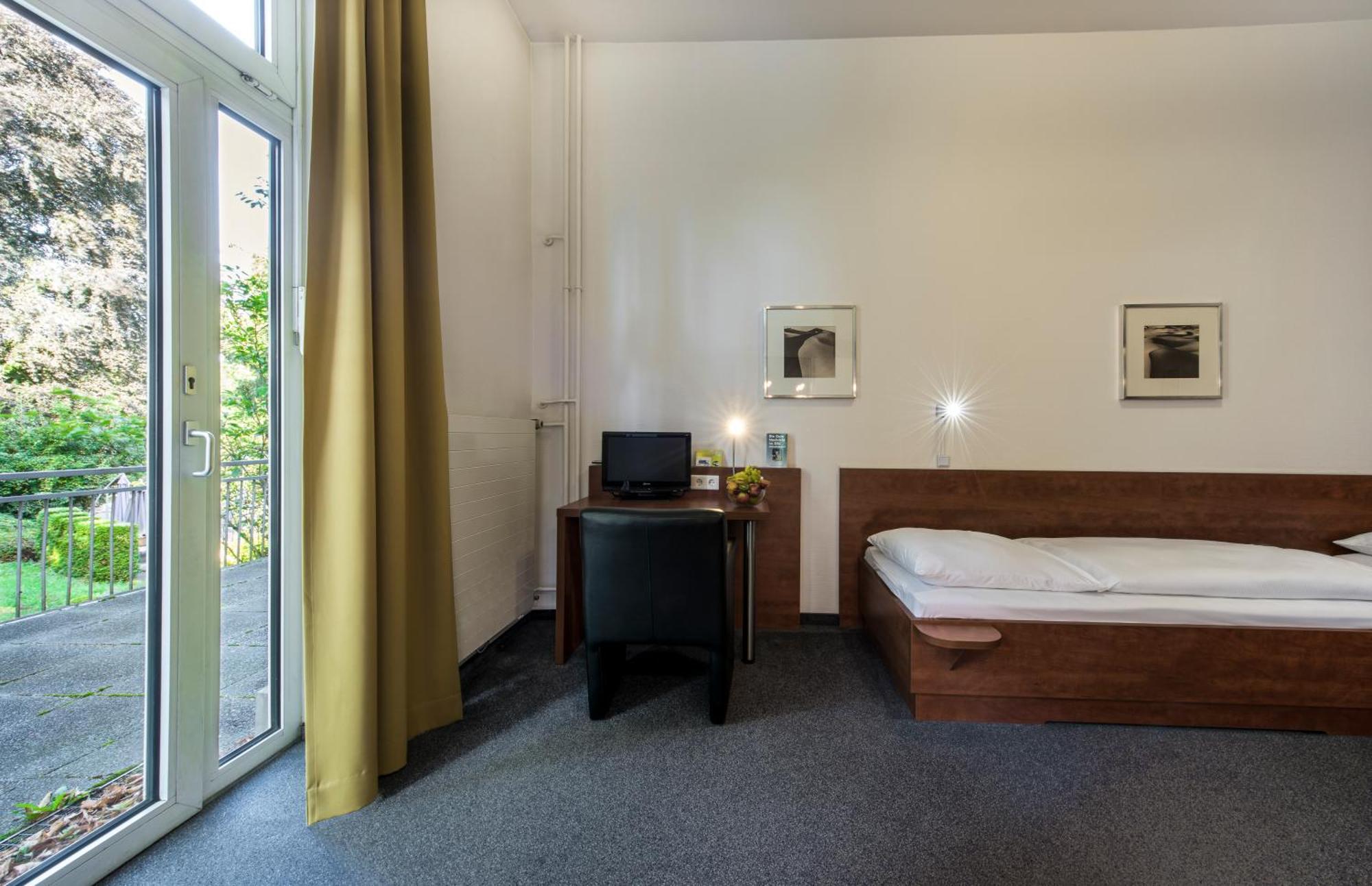 Cjd Bonn Castell Hotel Kamer foto